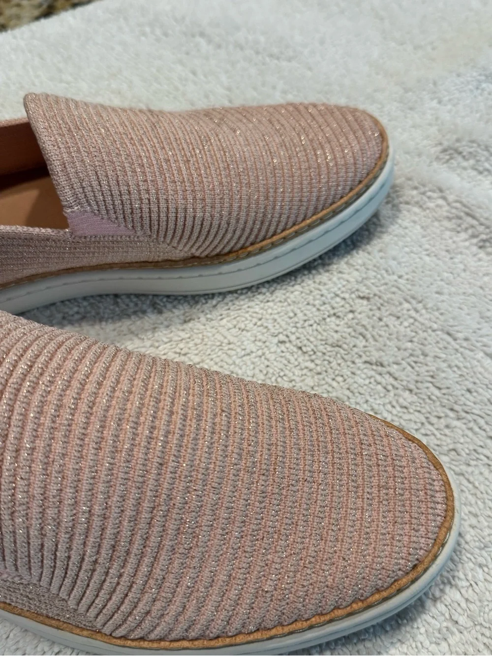 UGG Women's Slip-On Knit Flats in Blush Pink and has a beautiful glitter pink.
